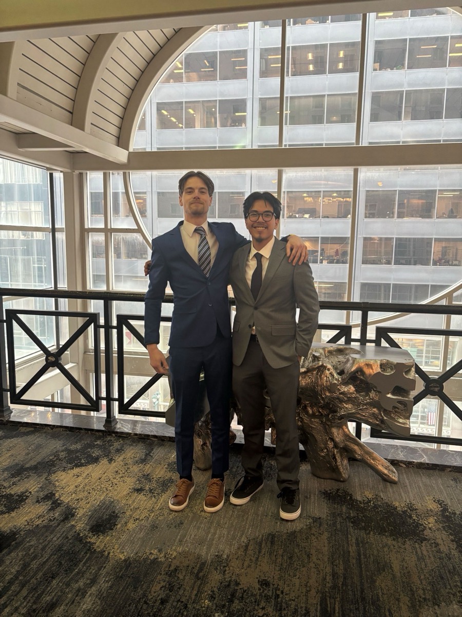 Two Greywolf Solutions team members at regional conference