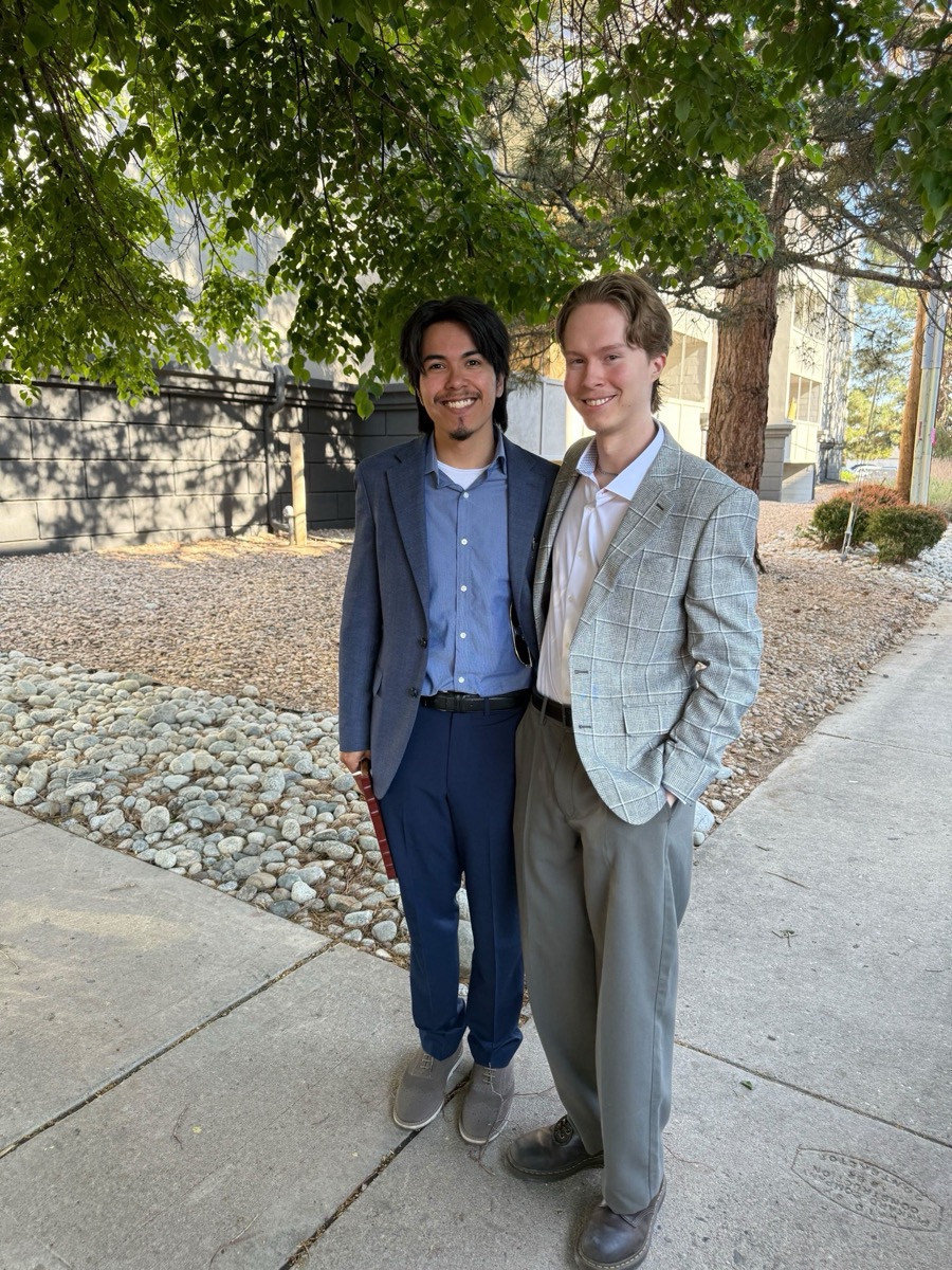 Greywolf Solutions team members outdoors in business casual attire